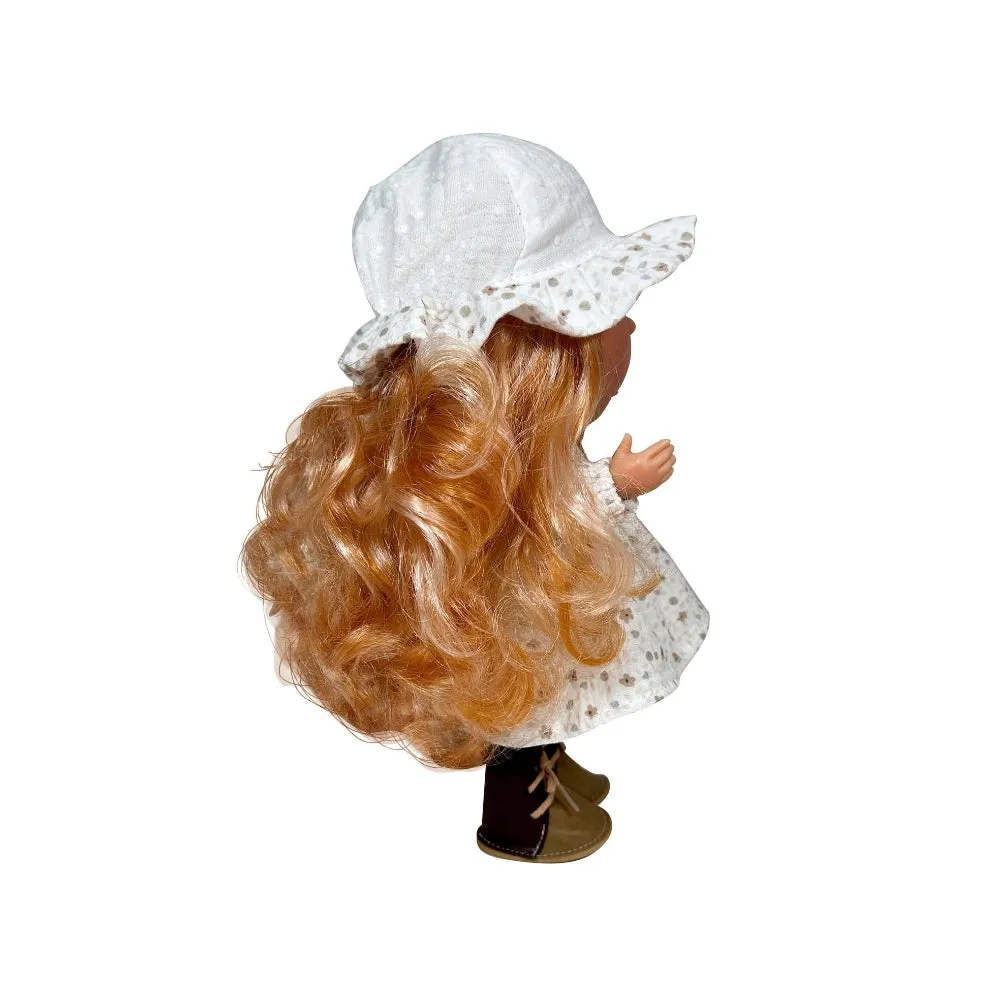 Mia in a Printed Floral Dress and Hat